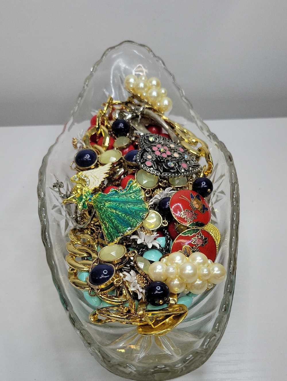Glass Dish Filled With Jewelry
